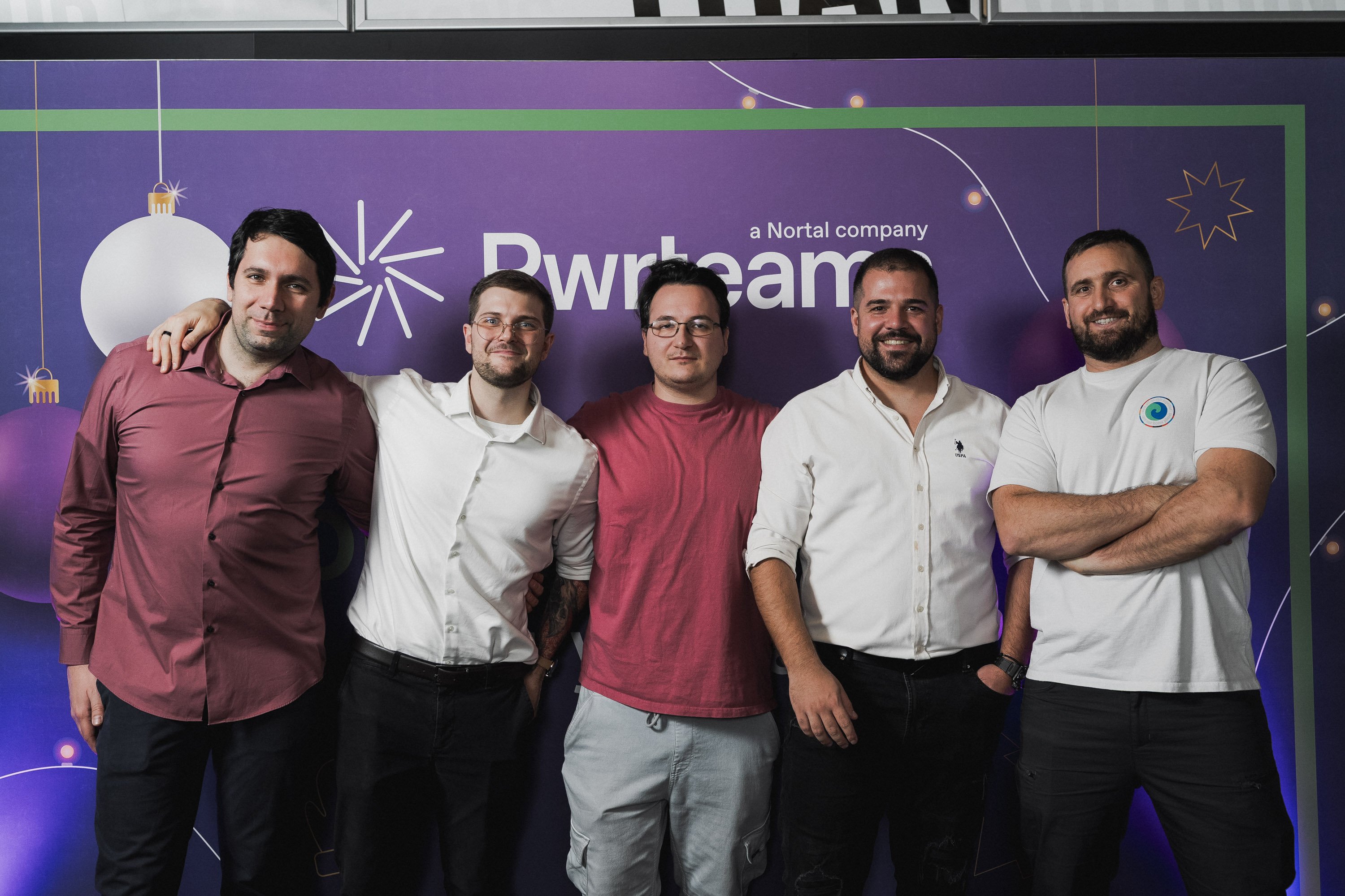 Picture of Zlatin Kostov and part of his team at News UK Tech's dedicated team at Pwrteams.
